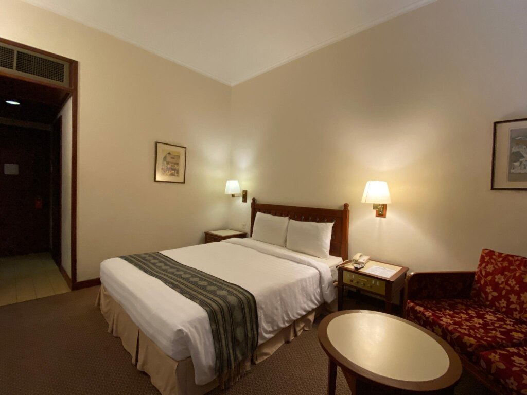 Кровать в общем номере Marco Polo Hotel - Tawau