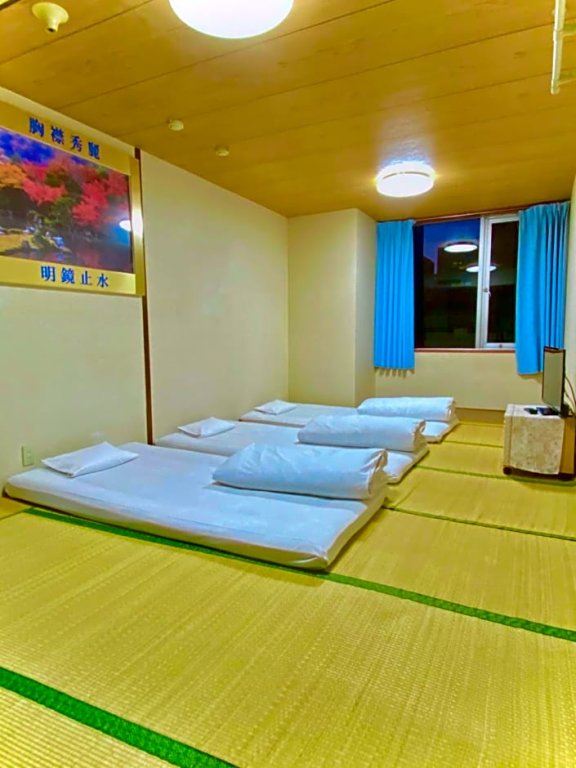 Standard Quadruple room Hotel Hoshi Kai Kan