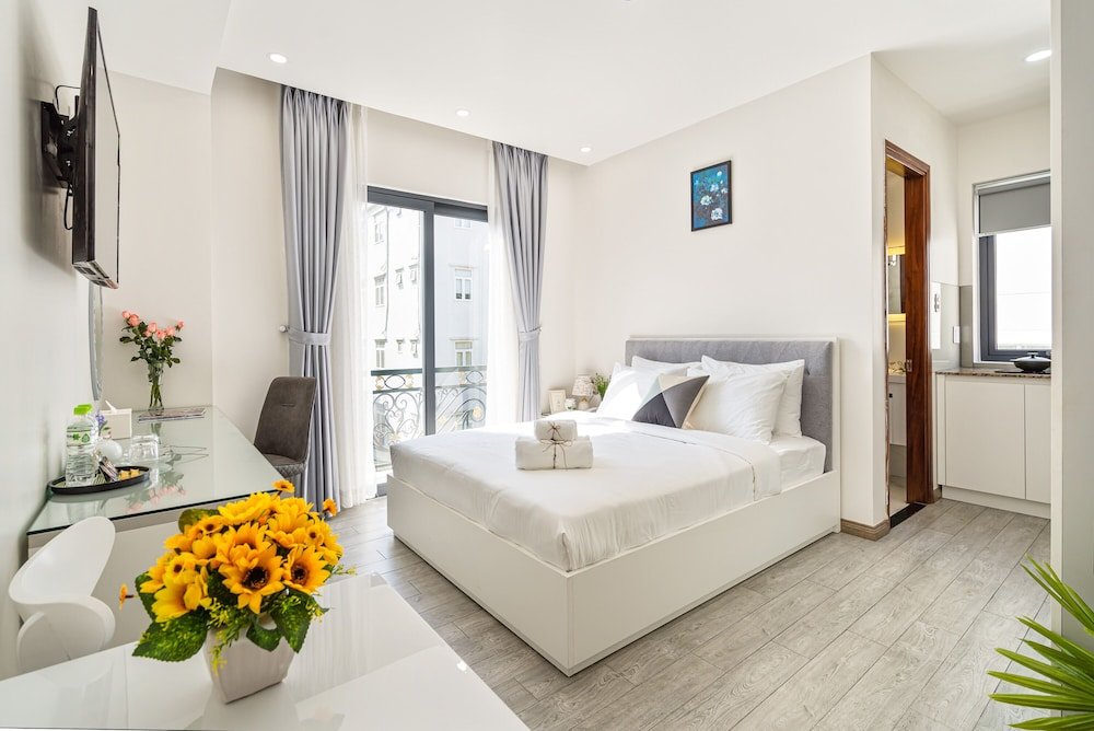 Deluxe Zimmer mit Balkon und mit Gartenblick The Royal Hotel & Apartment - Phu My Hung