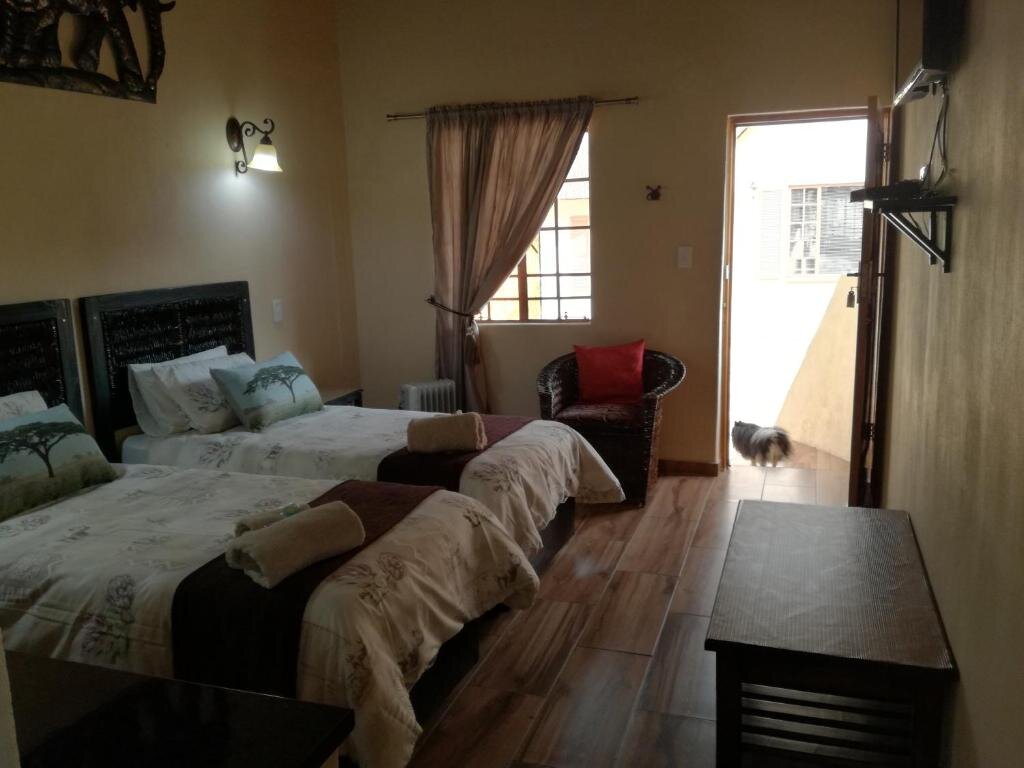 Deluxe chambre All over Africa Guest house