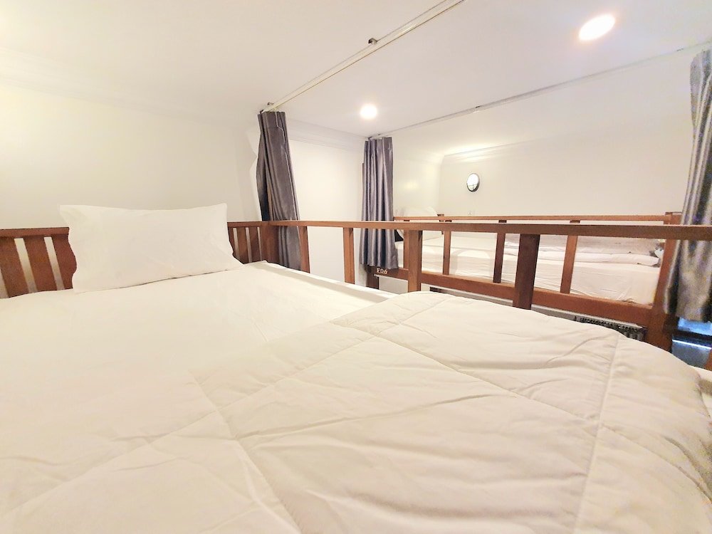 Кровать в общем номере Long Night Siem Reap Hotel