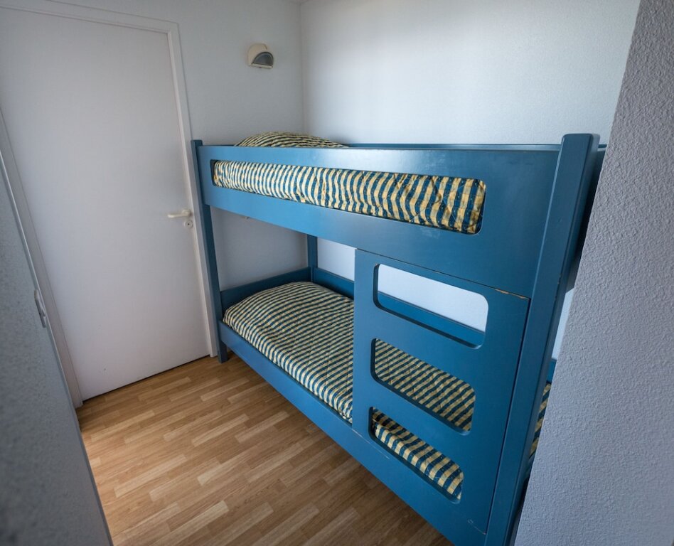 Кровать в общем номере с 2 комнатами Résidence Mer & Golf Eugénie