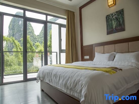 Кровать в общем номере CTN Li River Hotel