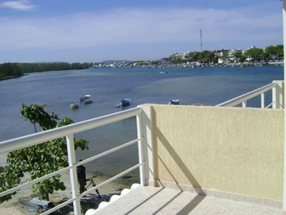 Superior room with balcony and with canal view Residencial Portoveleiro