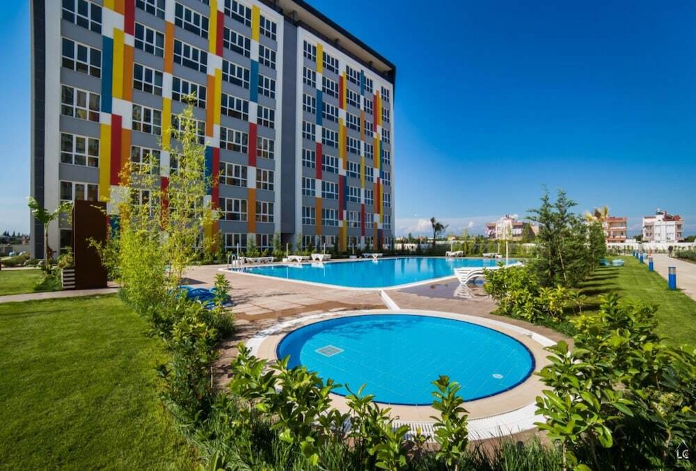 Central Flat With Shared Pool Near Antalya Airport Анталья