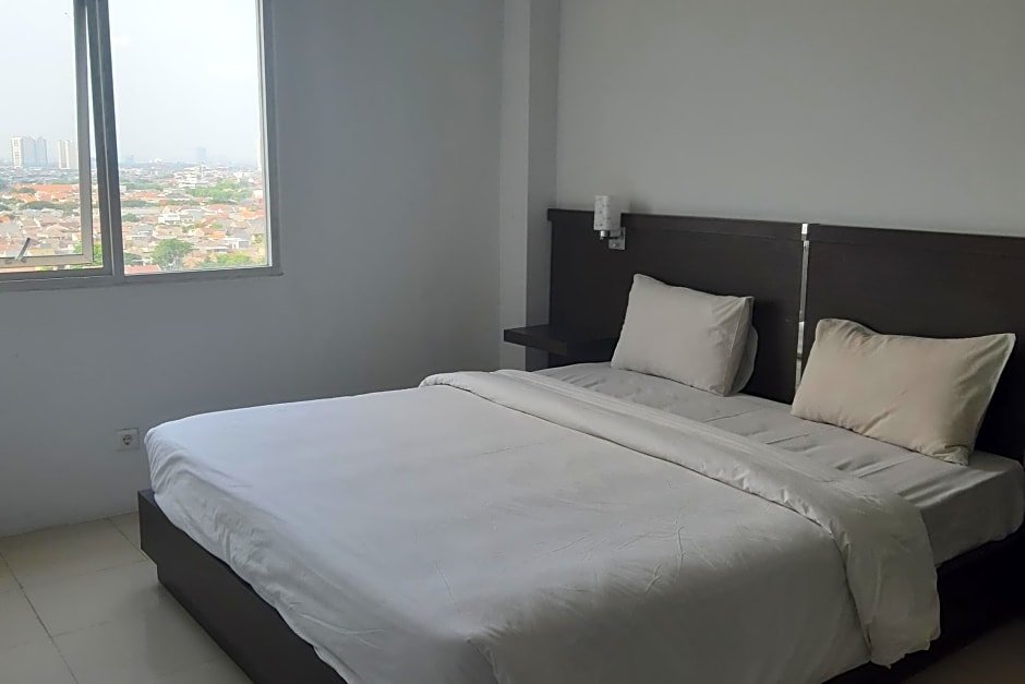 Suite OYO Flagship 90087 Apartment Menara Rungkut 2