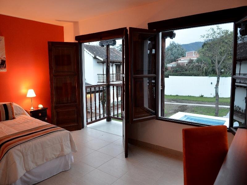 Трёхместный номер Standard с балконом и с красивым видом из окна Отель Posada de los Poetas Hotel Boutique