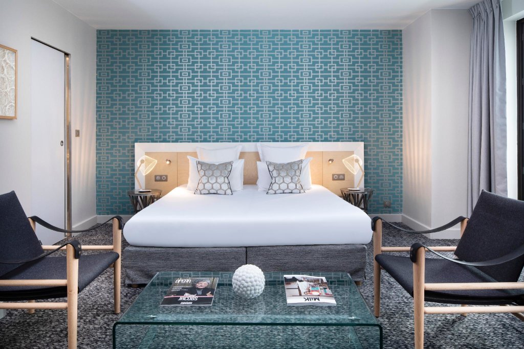 Кровать в общем номере Hotel Paris Bastille
