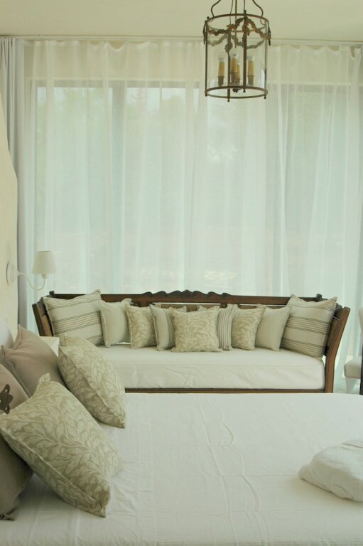 Standard Triple room with garden view Ulivi Al Sole - Charming B&B