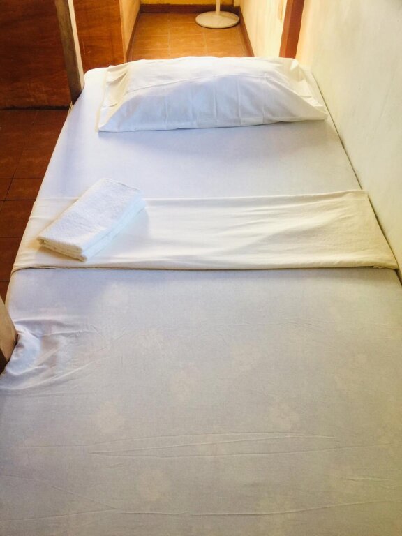 Кровать в общем номере Carabao Backpackers & Guesthouse