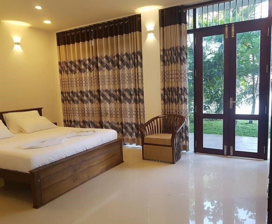 Habitación triple De lujo con vista al jardín Sanu Lagoon Resort & Spa