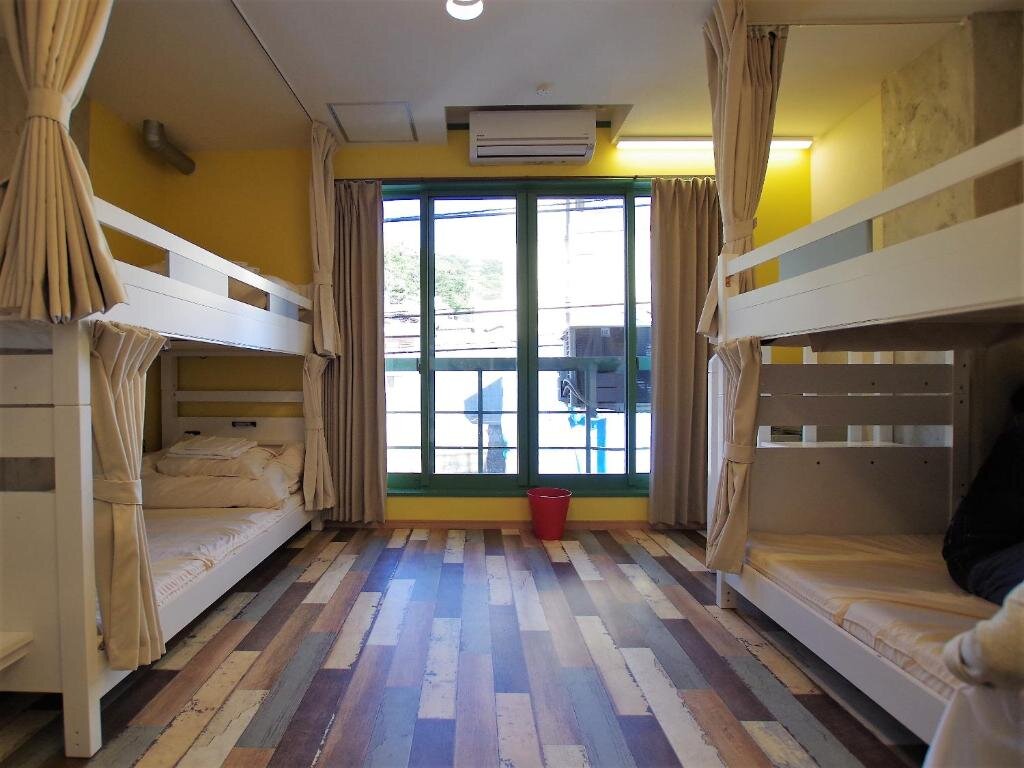 Кровать в общем номере (женский номер) Cinnamon Guesthouse Dogo
