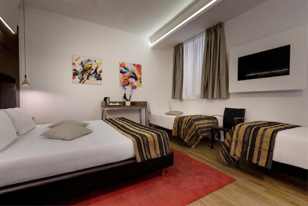 Четырёхместный номер Standard Hotel Rinascimento - Gruppo Trevi Hotels