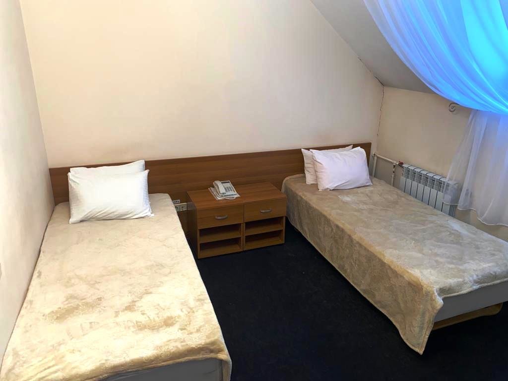 Cama en dormitorio compartido Hotel Lyuks