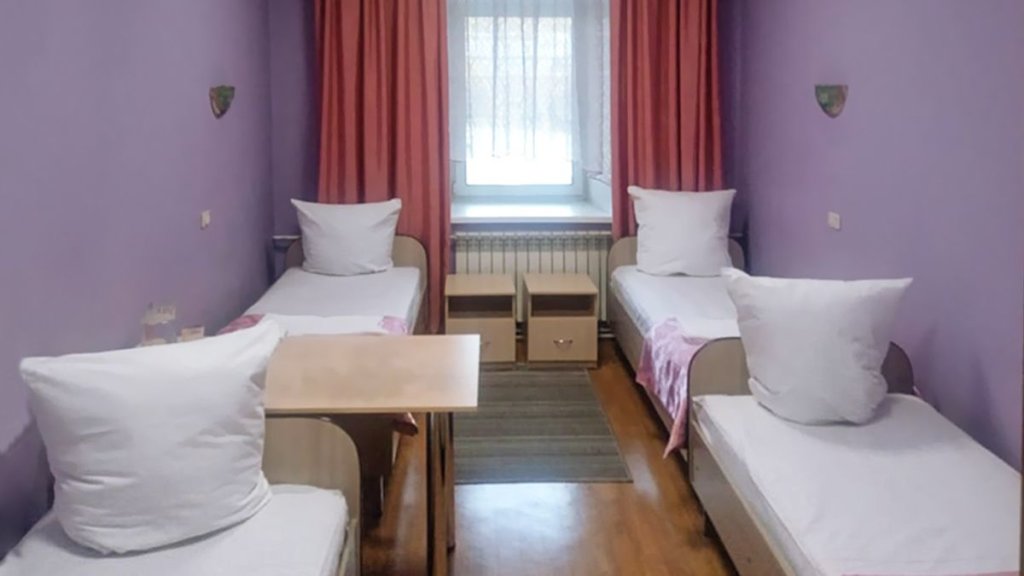Cama en dormitorio compartido Smart Hotel KDO Tynda Hotel