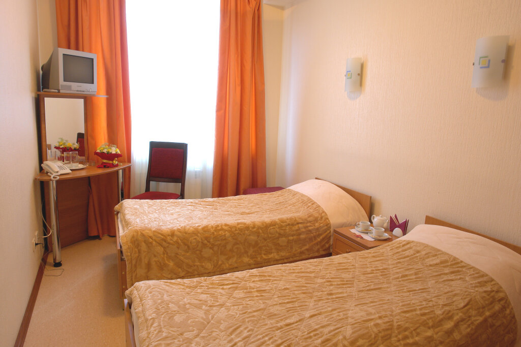 Кровать в общем номере Отель Де Пари