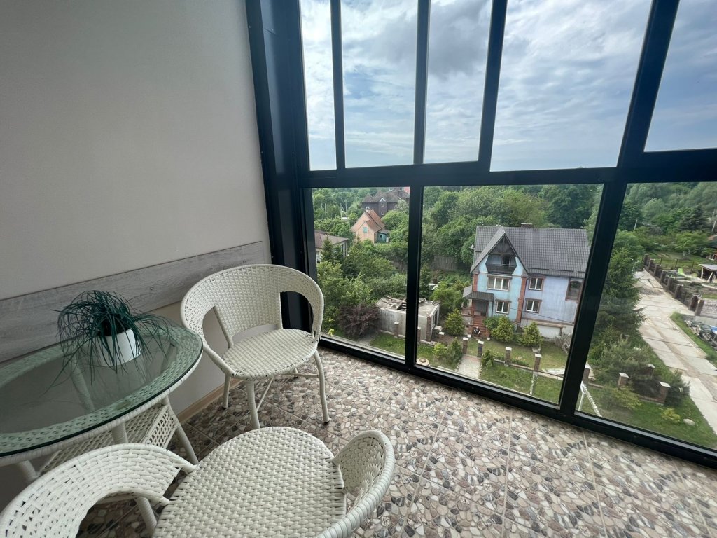 Апартаменты Comfort с 3 комнатами с балконом и с красивым видом из окна Апарт-отель Солнечный