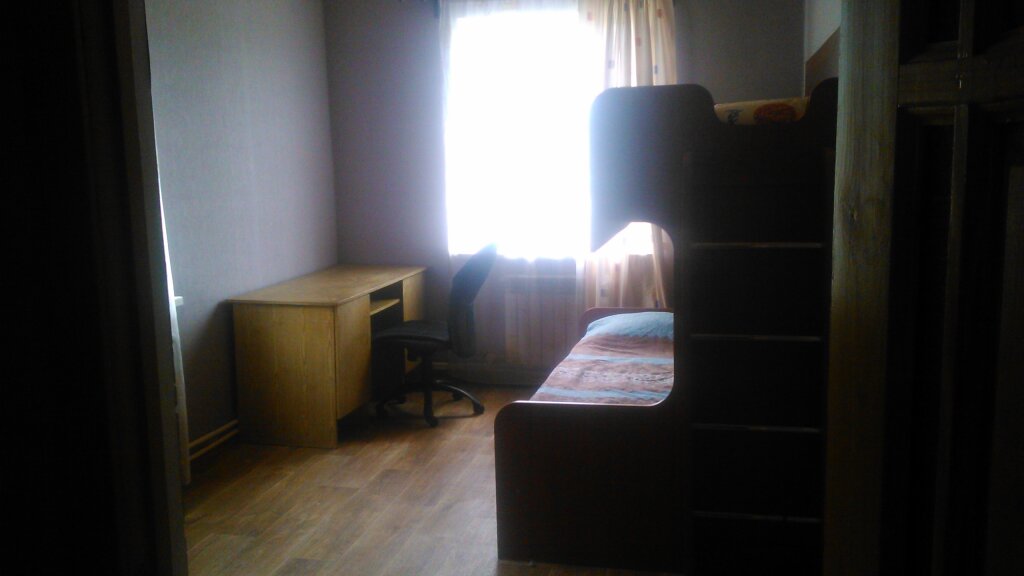 Cama en dormitorio compartido V Zalesnom M7 Guest house