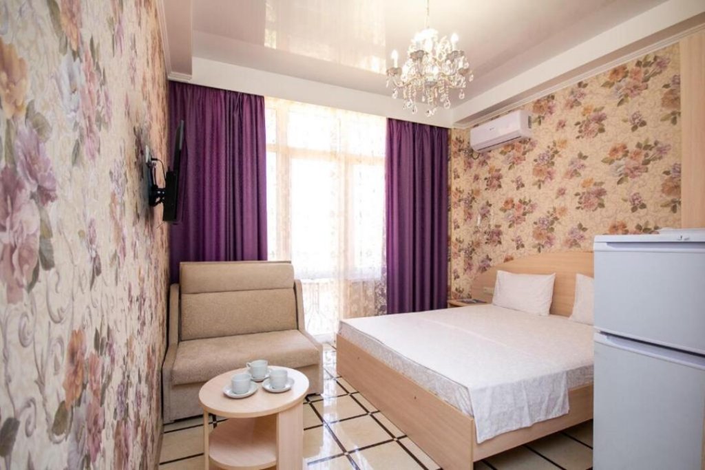 Confort triple chambre avec balcon Syuzen Guest house