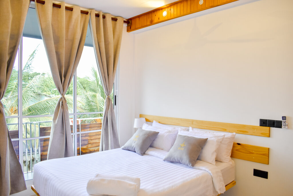 Deluxe double chambre avec balcon et Avec vue Dhoani Maldives Guesthouse