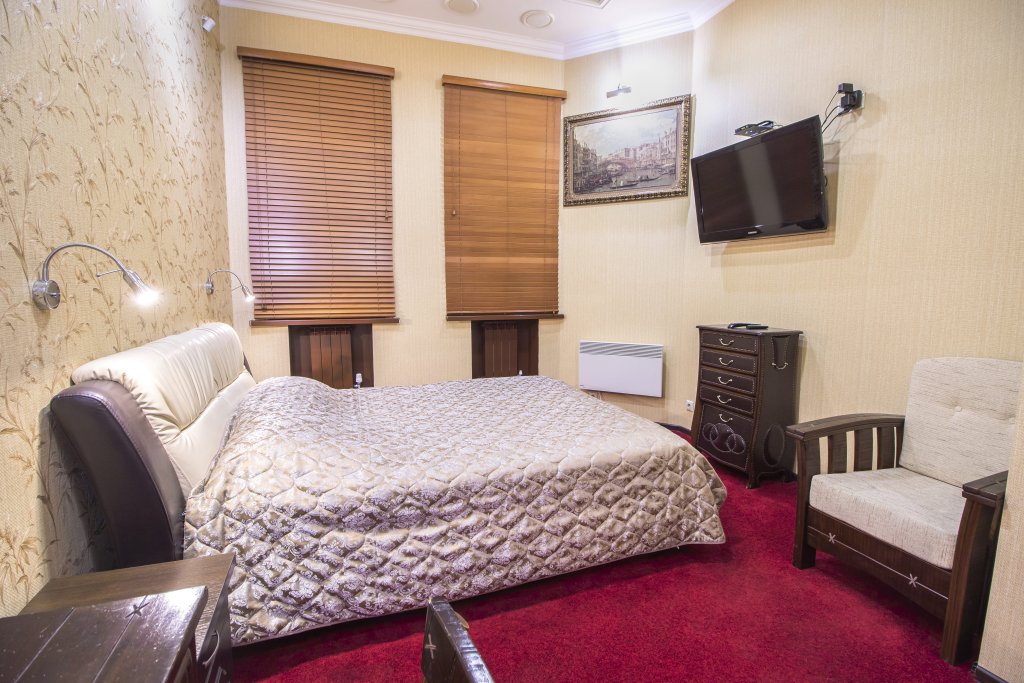 Четырёхместный семейный люкс с 2 комнатами Кают-Компания мини-отель
