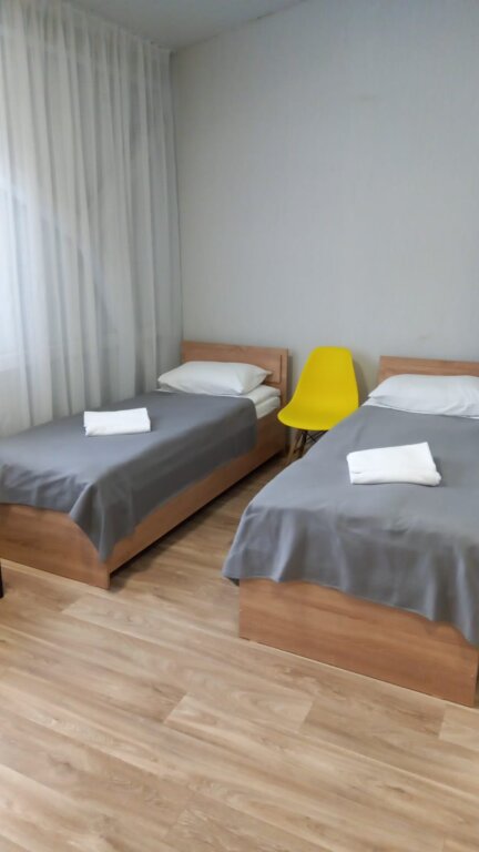 Кровать в общем номере Отель Скала
