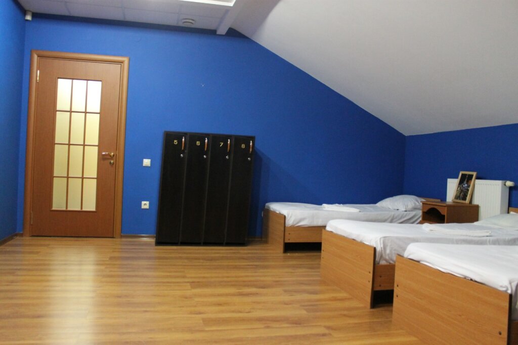 Cama en dormitorio compartido House Mini-hotel