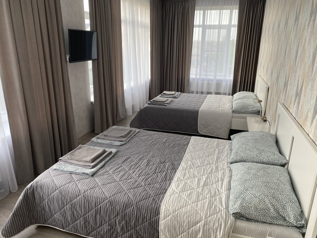 Standard Vierer Zimmer Rassvet Apartments Mini-Hotel