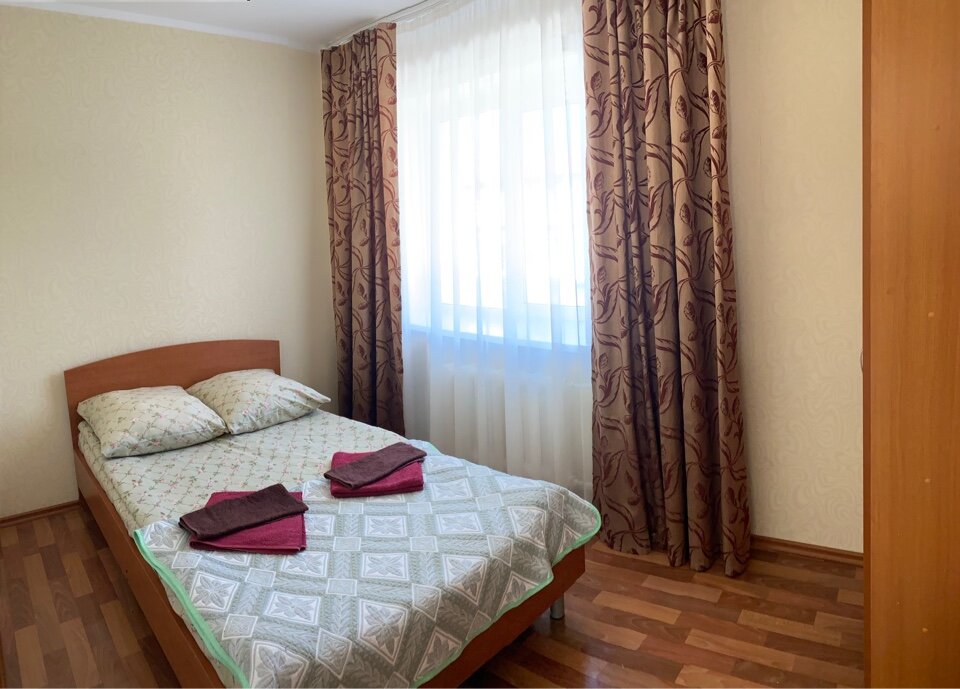 Suite 2 Schlafzimmer mit Stadtblick Hotel Yubileynaya