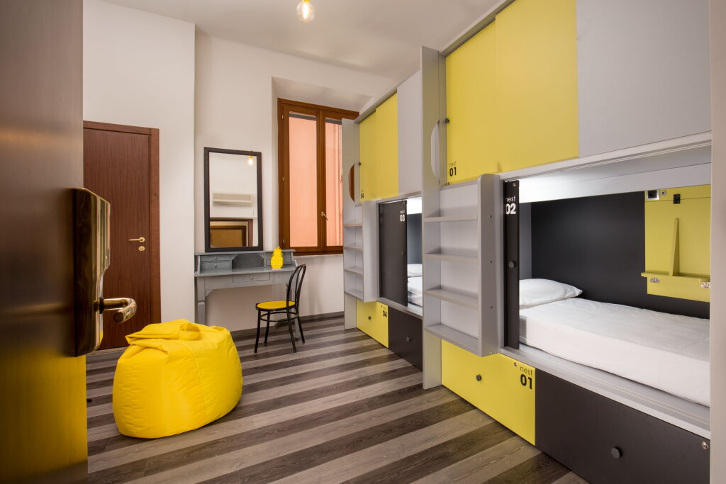 Кровать в общем номере Free Hostels Roma