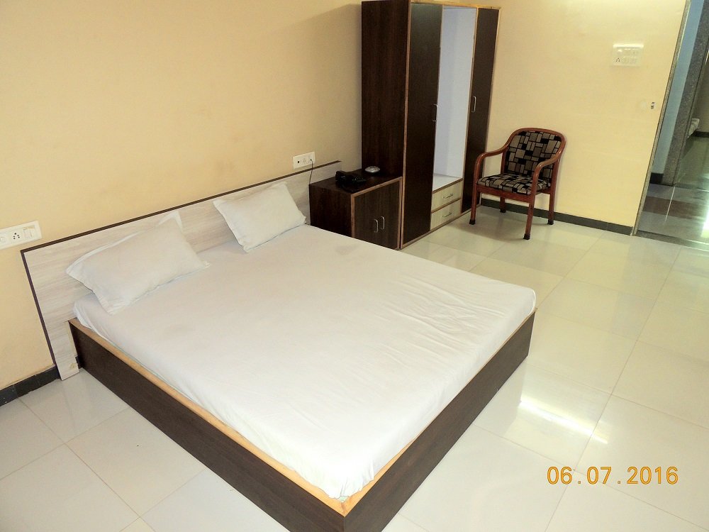 Deluxe room Rajvi Palace by sky stays Hotel
