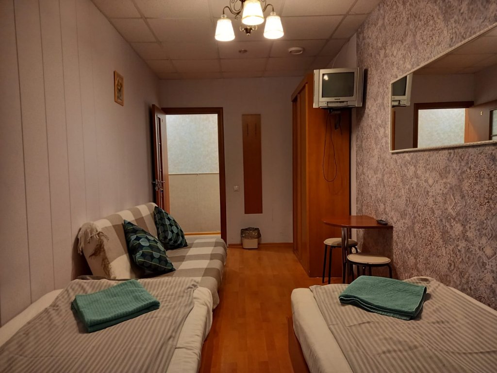 Économie triple chambre Severny Bereg Guest House