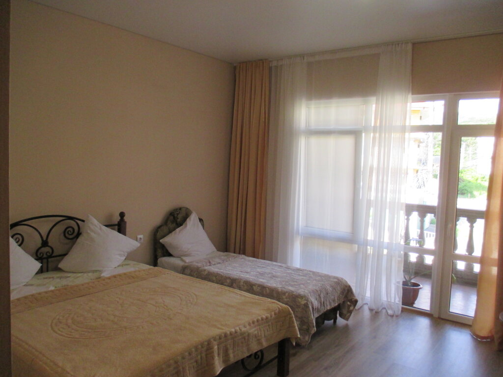 Standard quadruple chambre avec balcon Kilikiya Guest House