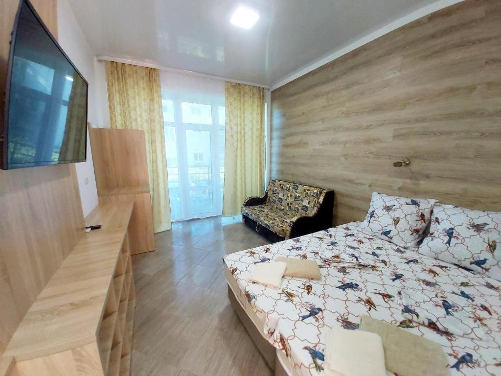 Standard famille chambre avec balcon Гостиничный комплекс "Оазис"