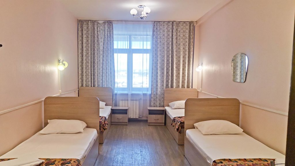 Кровать в общем номере Smart Hotel КДО Красноярск