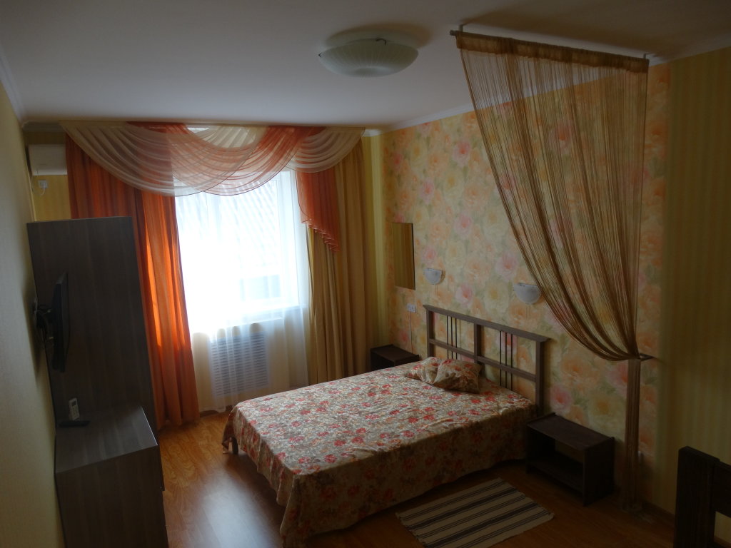 Habitación cuádruple Económica con balcón y con vista Uyutnyij Otdyih Guest House
