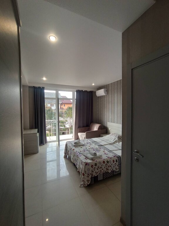 Comfort Triple room with balcony Valensiya Guest House