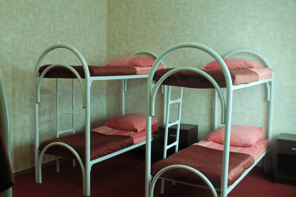 Кровать в общем номере Гостиница Полет