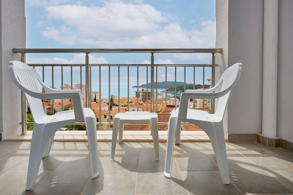 Suite junior Sea View con balcón Garni Hotel Larimar