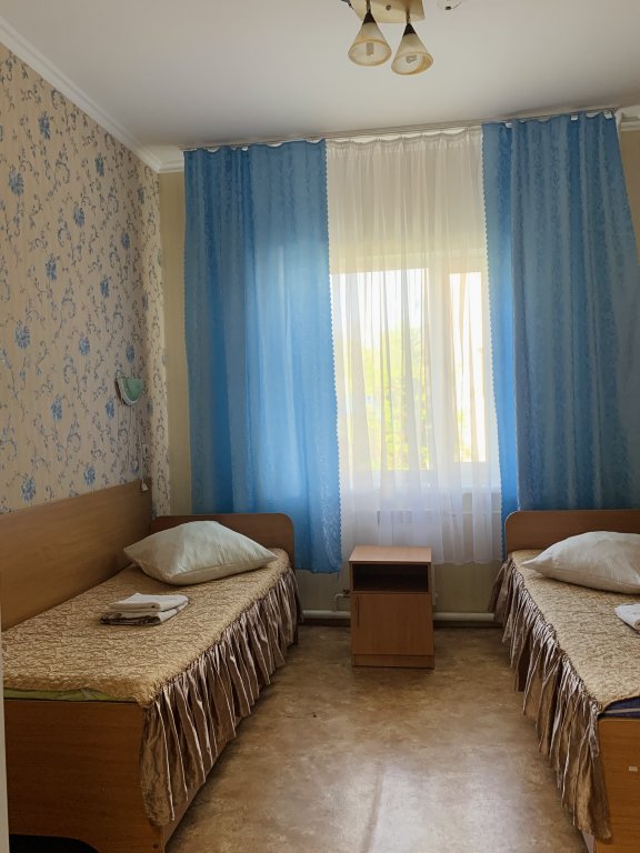 Cama en dormitorio compartido Gorodok Hotel