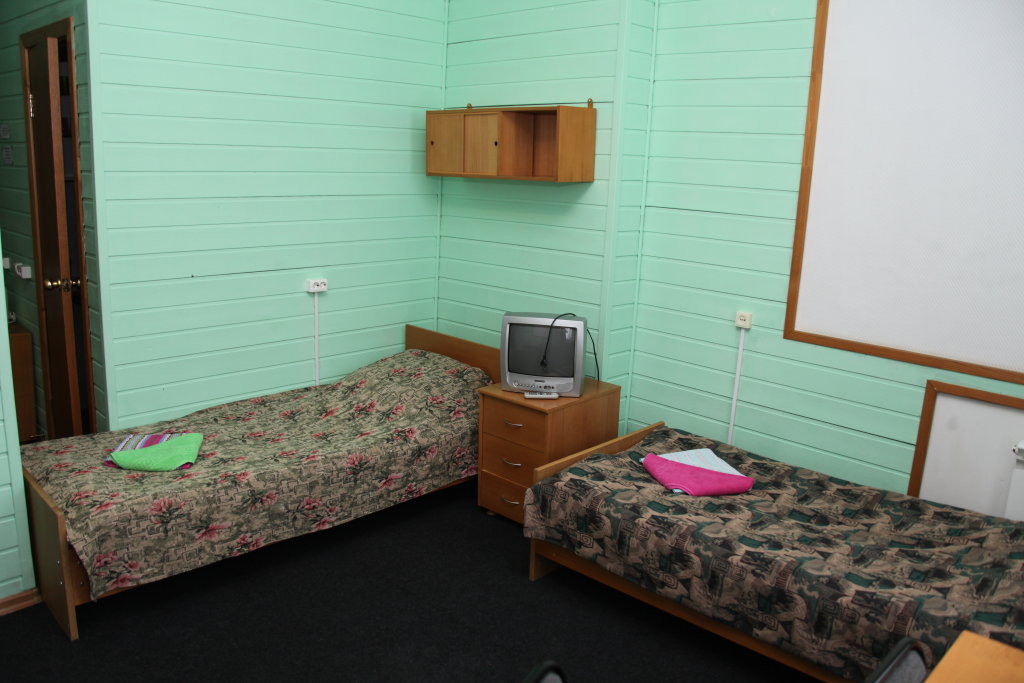 Кровать в общем номере (мужской номер) Мини Отель Дом Аспиранта