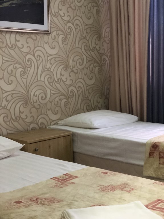 Кровать в общем номере Мини-Отель Патио