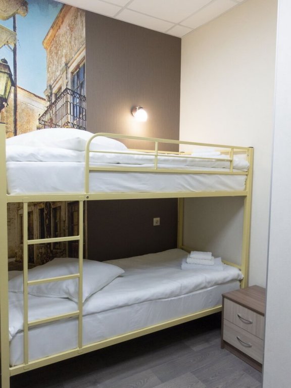Кровать в общем номере Бутик-отель Silver