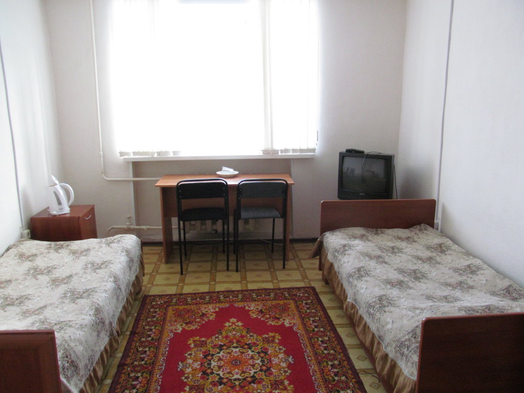 Кровать в общем номере (женский номер) с видом на город Гостиница Чусовская
