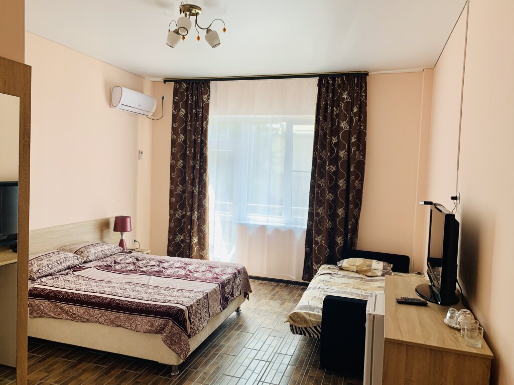 Standard quadruple chambre avec balcon Гостевой дом KZ