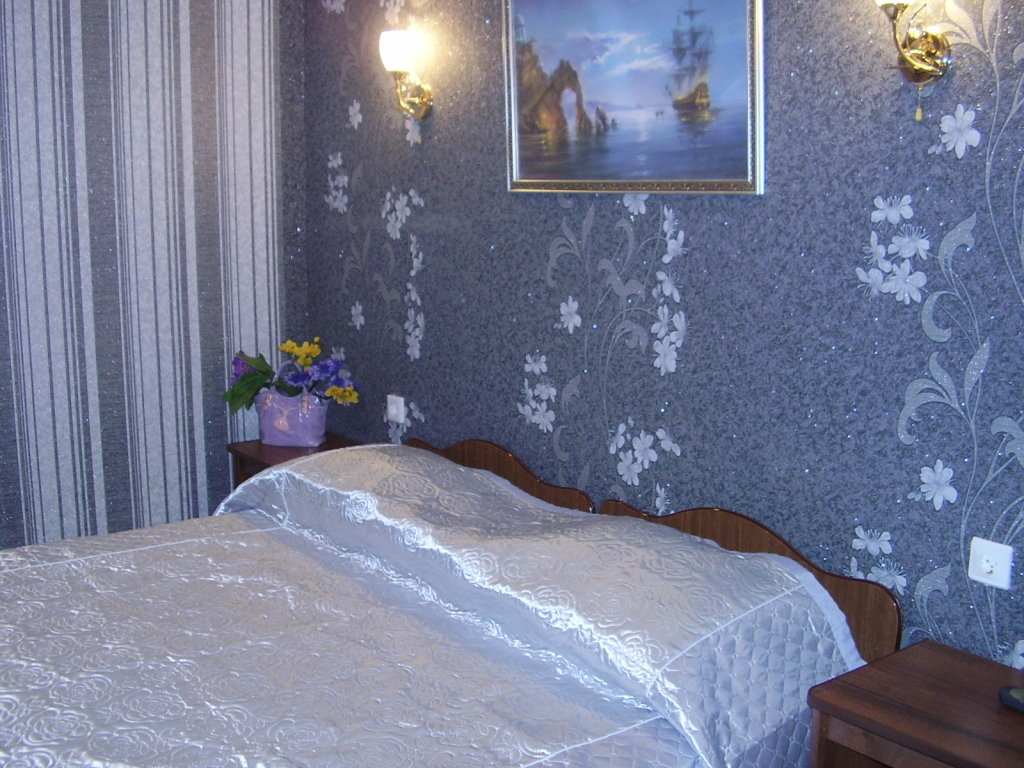Suite cuádruple 2 dormitorios con vista Olga Mini-Hotel