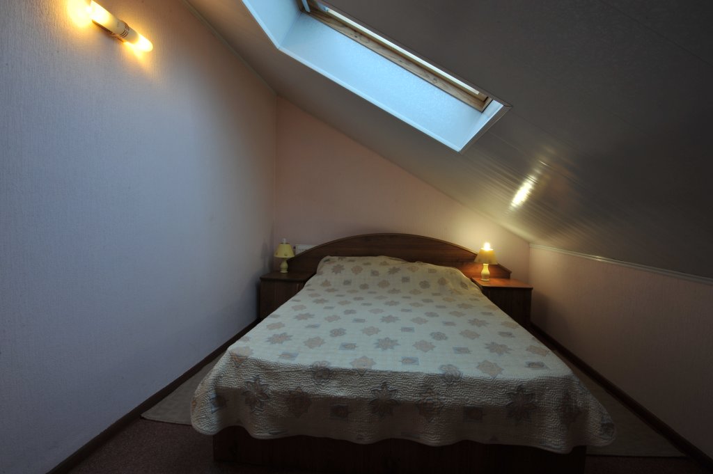 Cama en dormitorio compartido Falkon Tamani Guest House