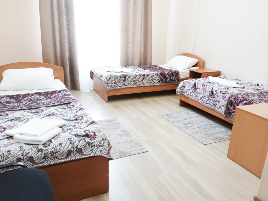 Cama en dormitorio compartido Hotel  Smart Hotel Kdo Tambov