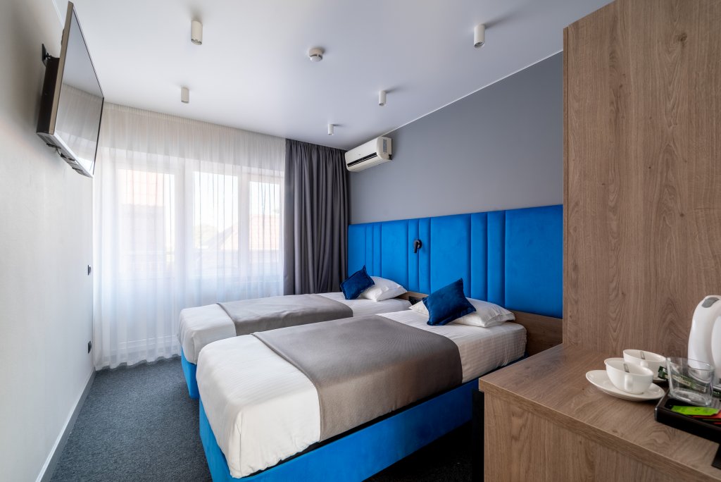 Двухместный номер Comfort с балконом ОХОТНИК Отель & SPA by Orion Hotels