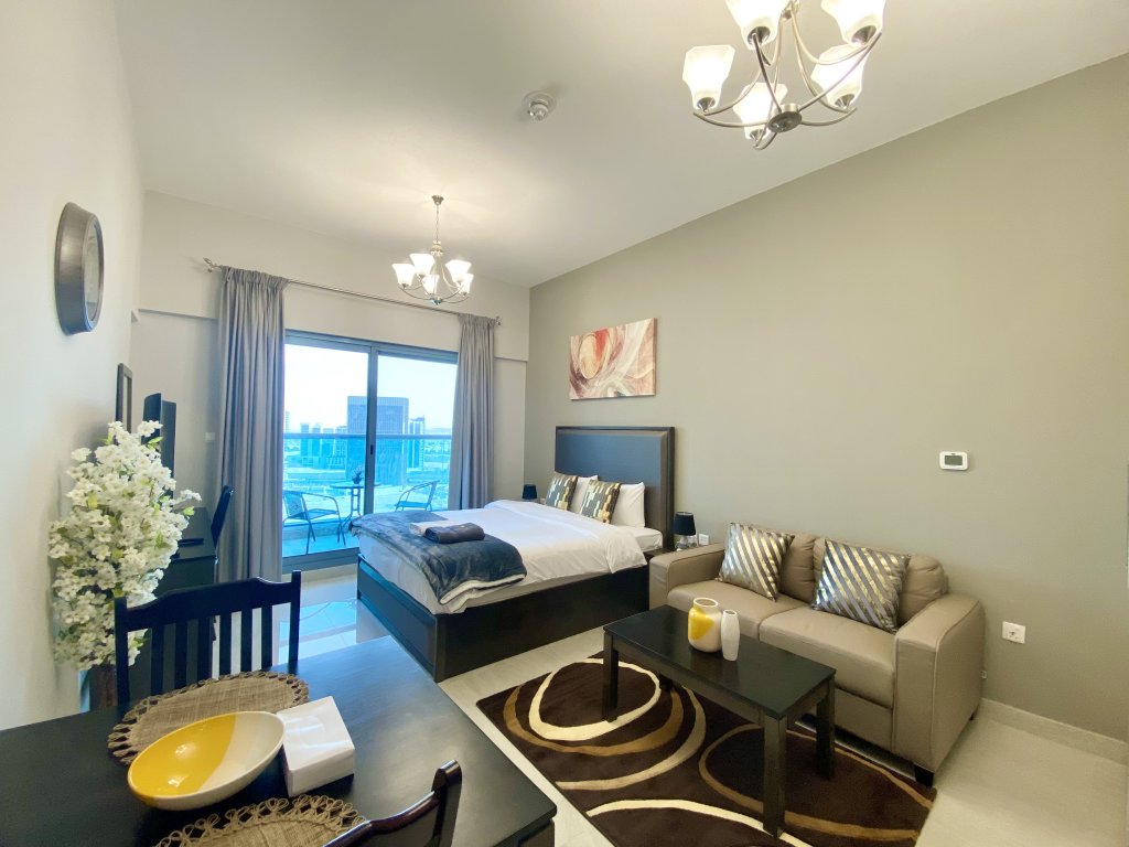 Апартаменты Апартаменты Studio | Burj khalifa & Lake view | Business Bay